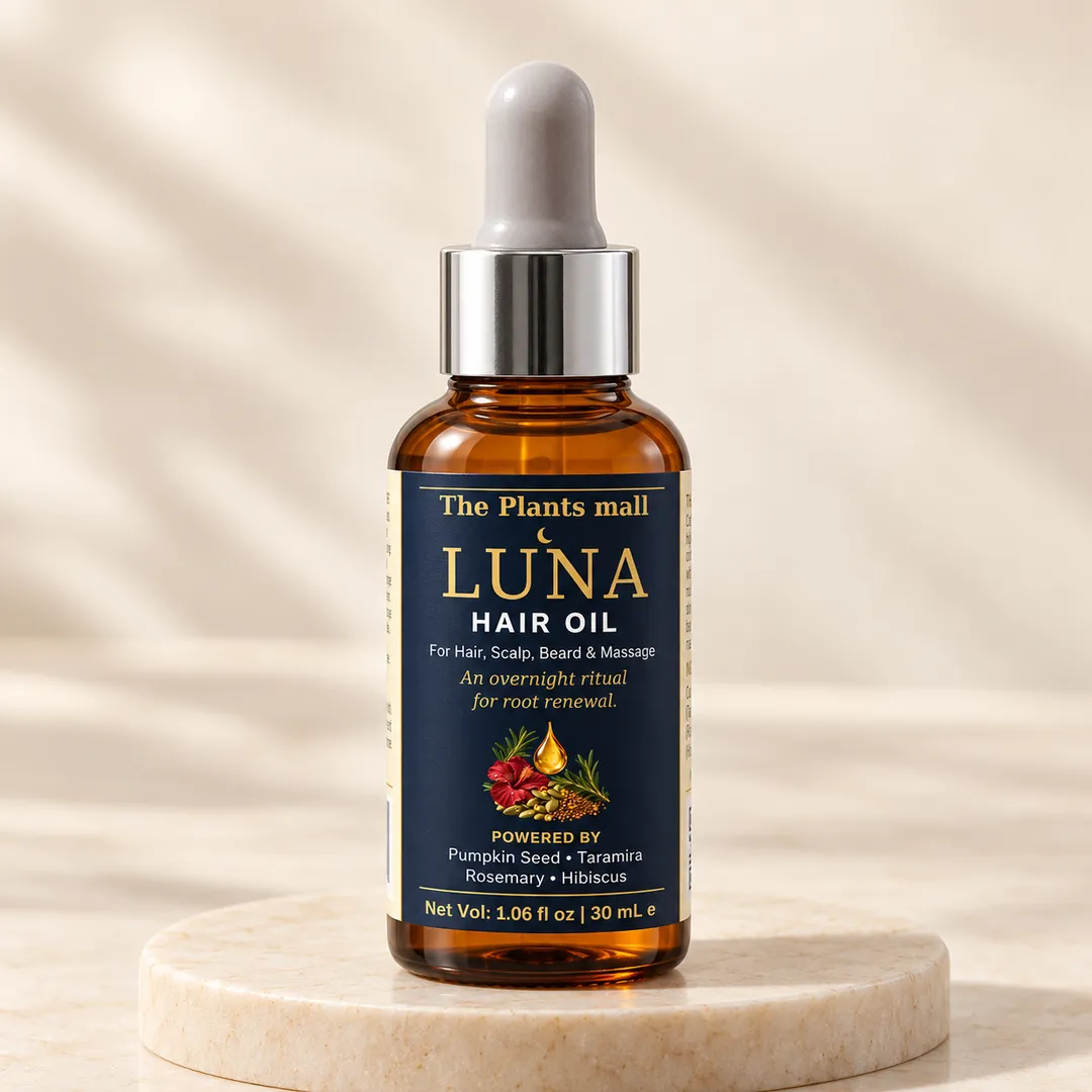 Golden-liquid-droplet-of-Luna-Hair-and-Scalp-Oil-being-applied-to-scalp